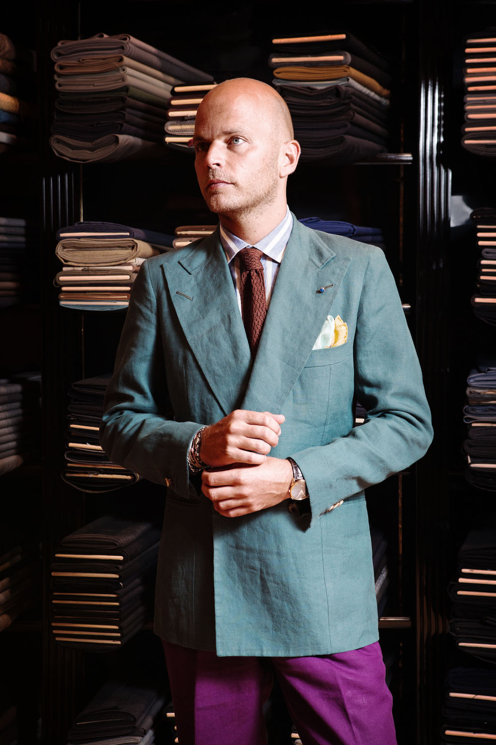 Luca's seafoam green linen double-breasted coat is trademark Rubinacci; colourful and nonchalant. He says 'having the buttons rolled low on a double-breasted jacket lends it an easier feel. I tend to button it to the higher button when I need to dress more formally'.