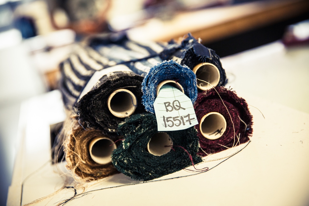 Rolls of silk jacquard awaiting cutting.