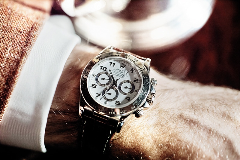 A Rolex Daytona on a leather crocodile strap has both aesthetic assiduousness and deep sentimentality, for the previous owner was his late father, whom Darius remembers wearing it.