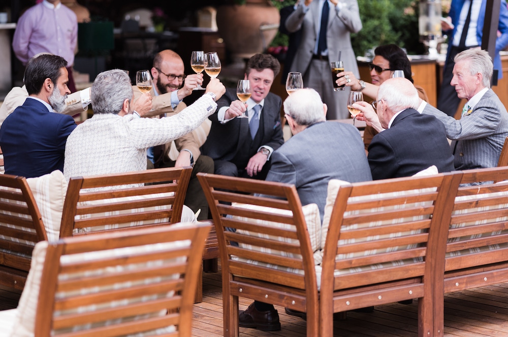 An impromptu toast to the tailor's art.