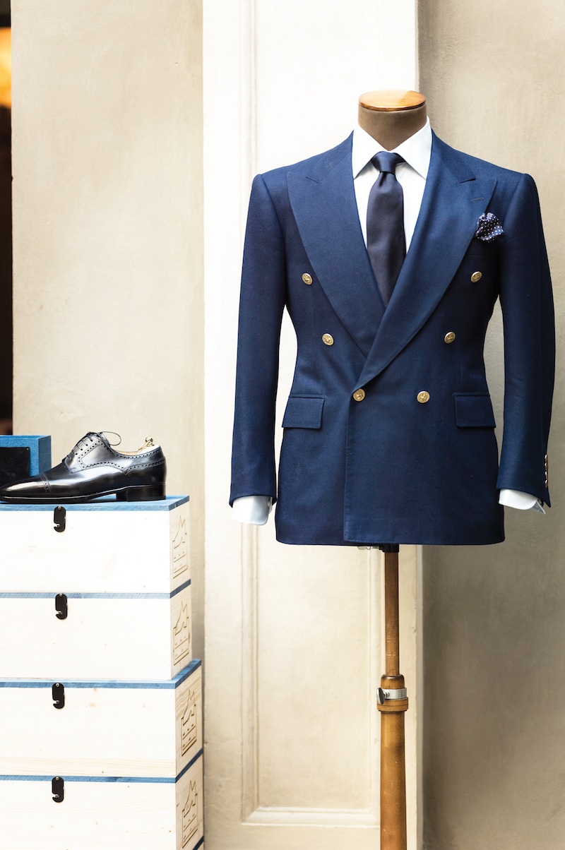 Cifonelli's French blue flannel blazer sits next to a timeless black brogue.