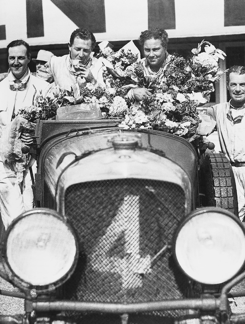 Glen Kidston (second from the left) and Woolf Barnato (third from the left) at their victorious 1930 Le Mans race.