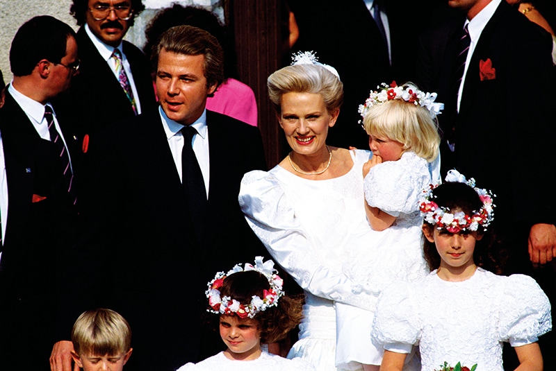 Newlyweds Thierry Roussel and Marianne Landhage with their bridesmaids, including Thierry's five-year-old daughter Athina (centre), and the couple's three-year-old daughter Sandrine (in her mother's arms).