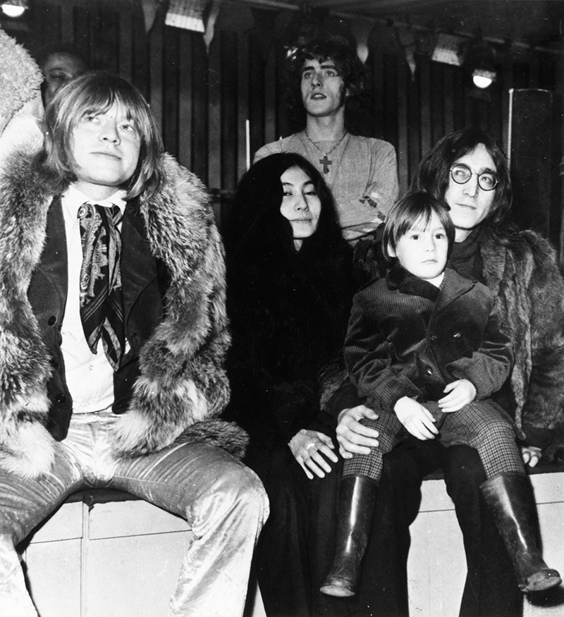 Brian Jones (1942 - 1969) with Yoko Ono, John Lennon (1940 - 1980) of the Beatles and the latter's son, Julian at a Wembley studio.