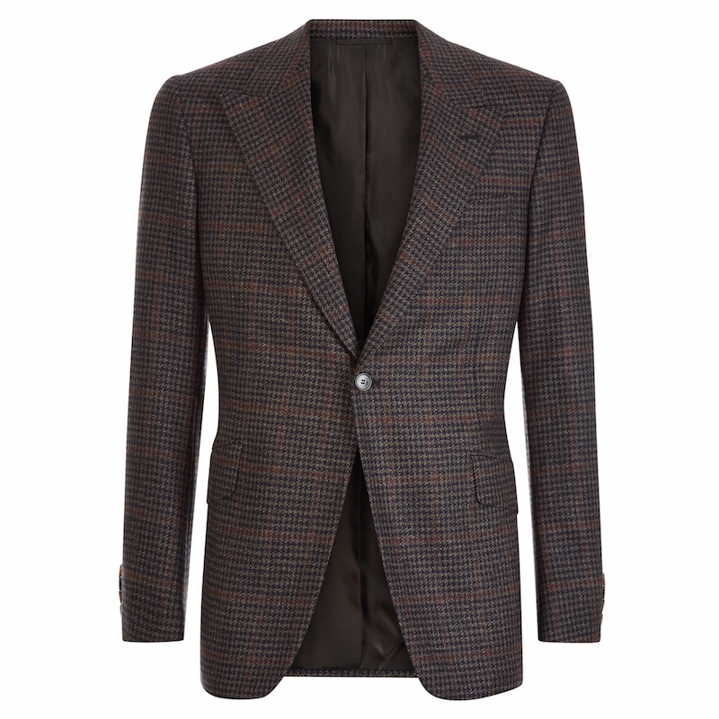 One of Huntsman's marvelous subtly checked sports coats, this one features the house's signature peaked lapel.