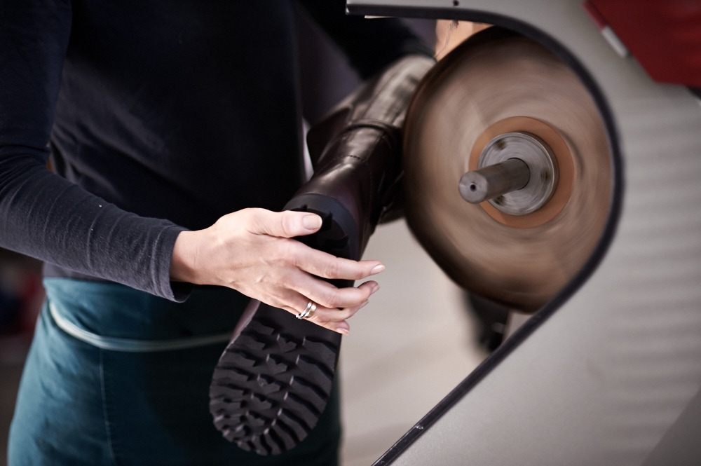 The boots go through several stages of gentle polishing, building up the soft, waxy finish required of the leather.