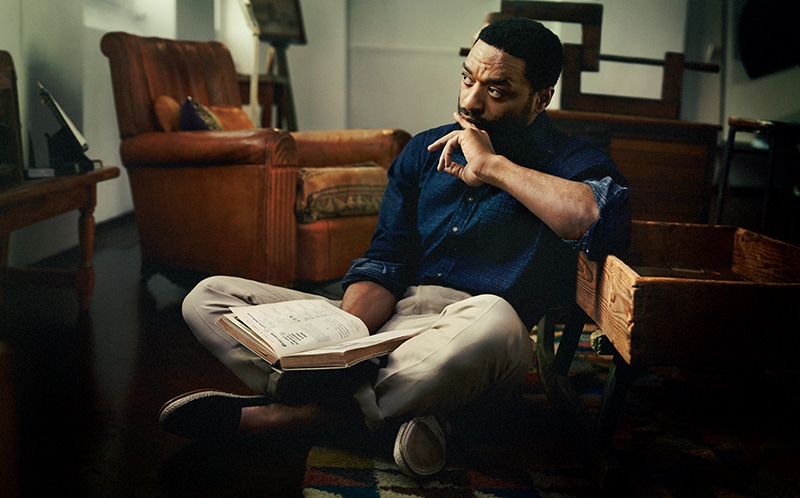 ï¿¼Oxford-blue cotton spotted textured shirt, Drake's; sand- brown wool and linen trousers, Dunhill; black suede espadrilles, Dolce & Gabbana.