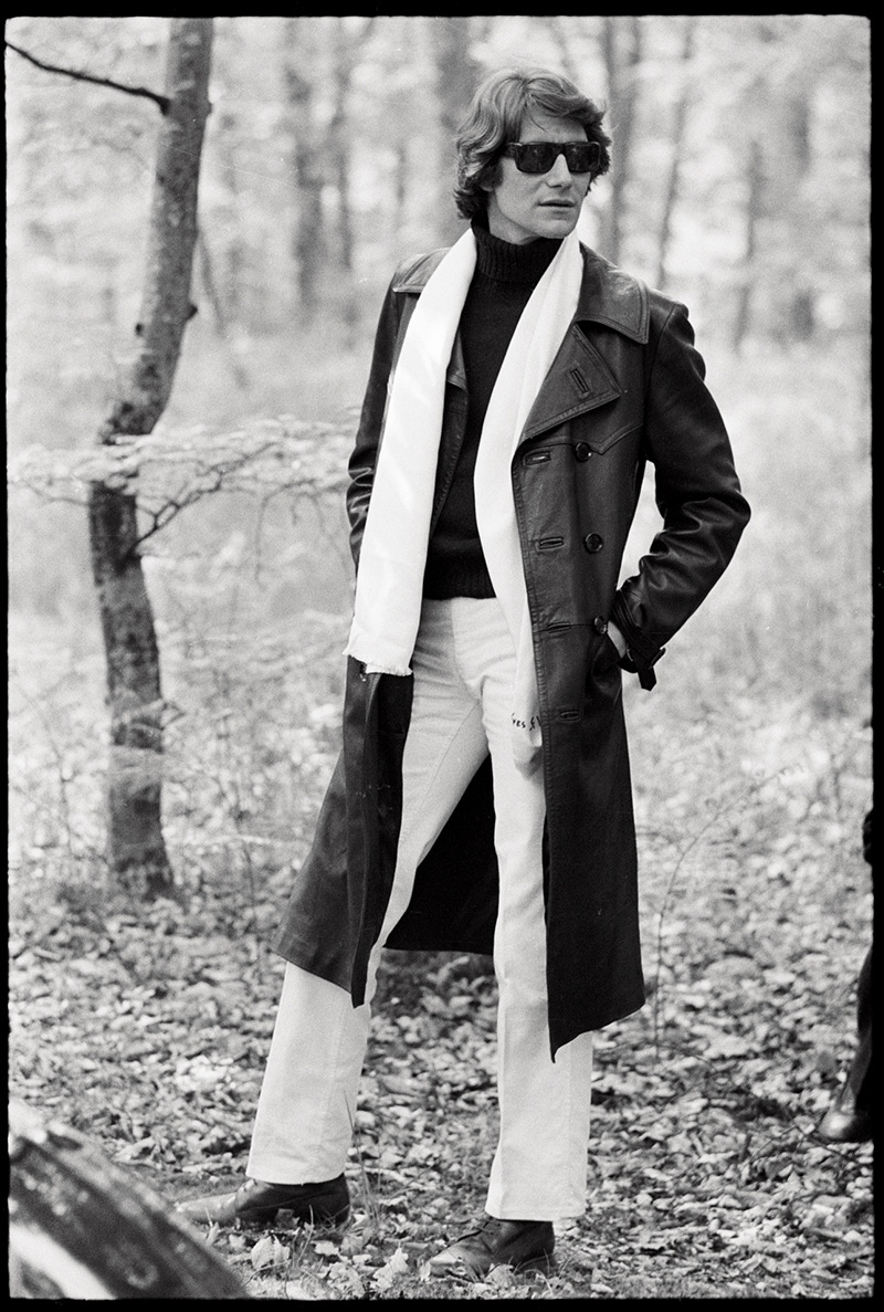 Algerian-born fashion designer Yves Saint Laurent poses outdoors in a leather trenchcoat and sunglasses in the CBS special 'The Paris Collections Fall Fashion Preview,' June 26, 1968. (Photo by CBS Photo Archive/Getty Images)