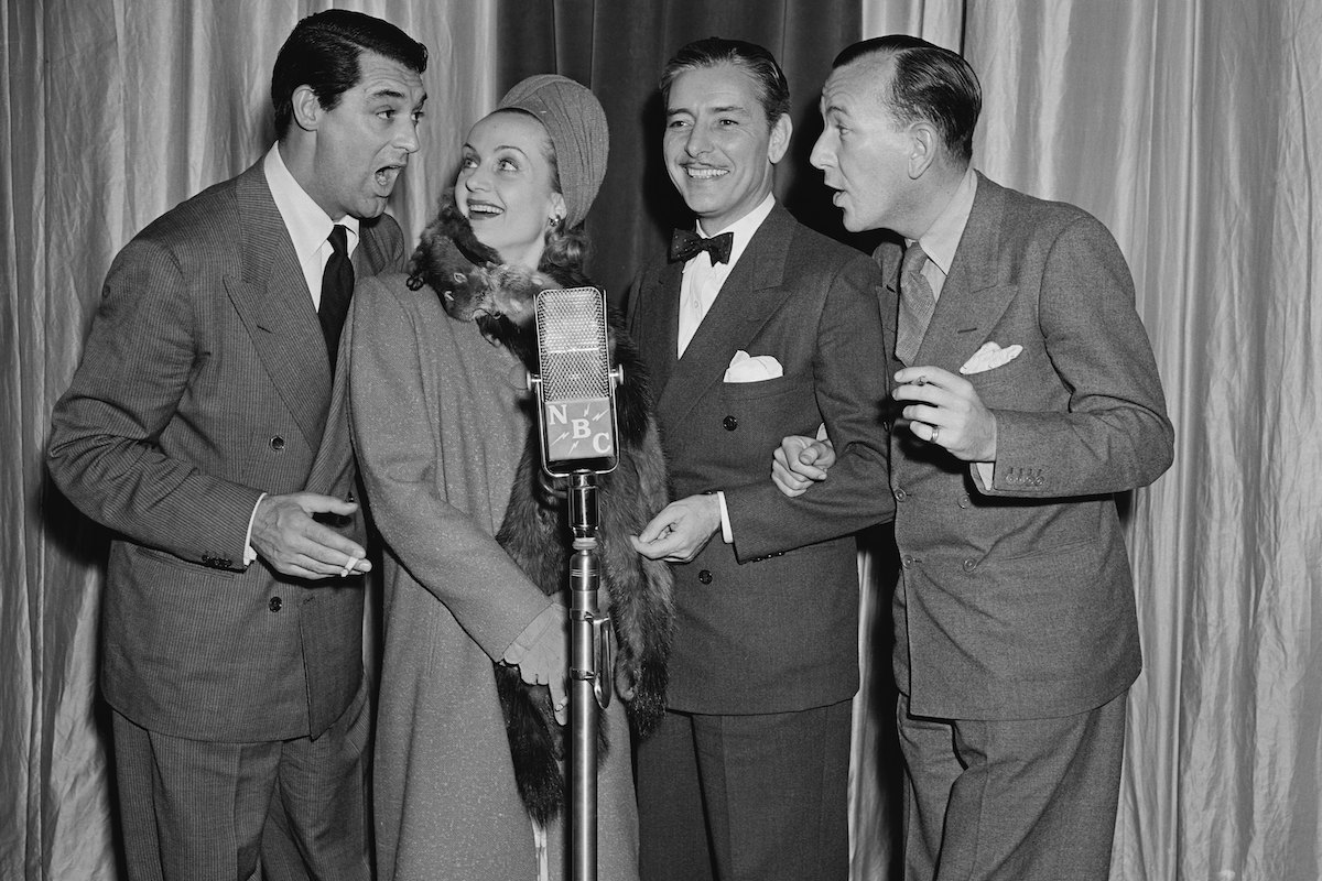 Cary Grant, Carol Lombard, Ronald Colman and Noel Coward. (Photo by NBCU Photo Bank via Getty)