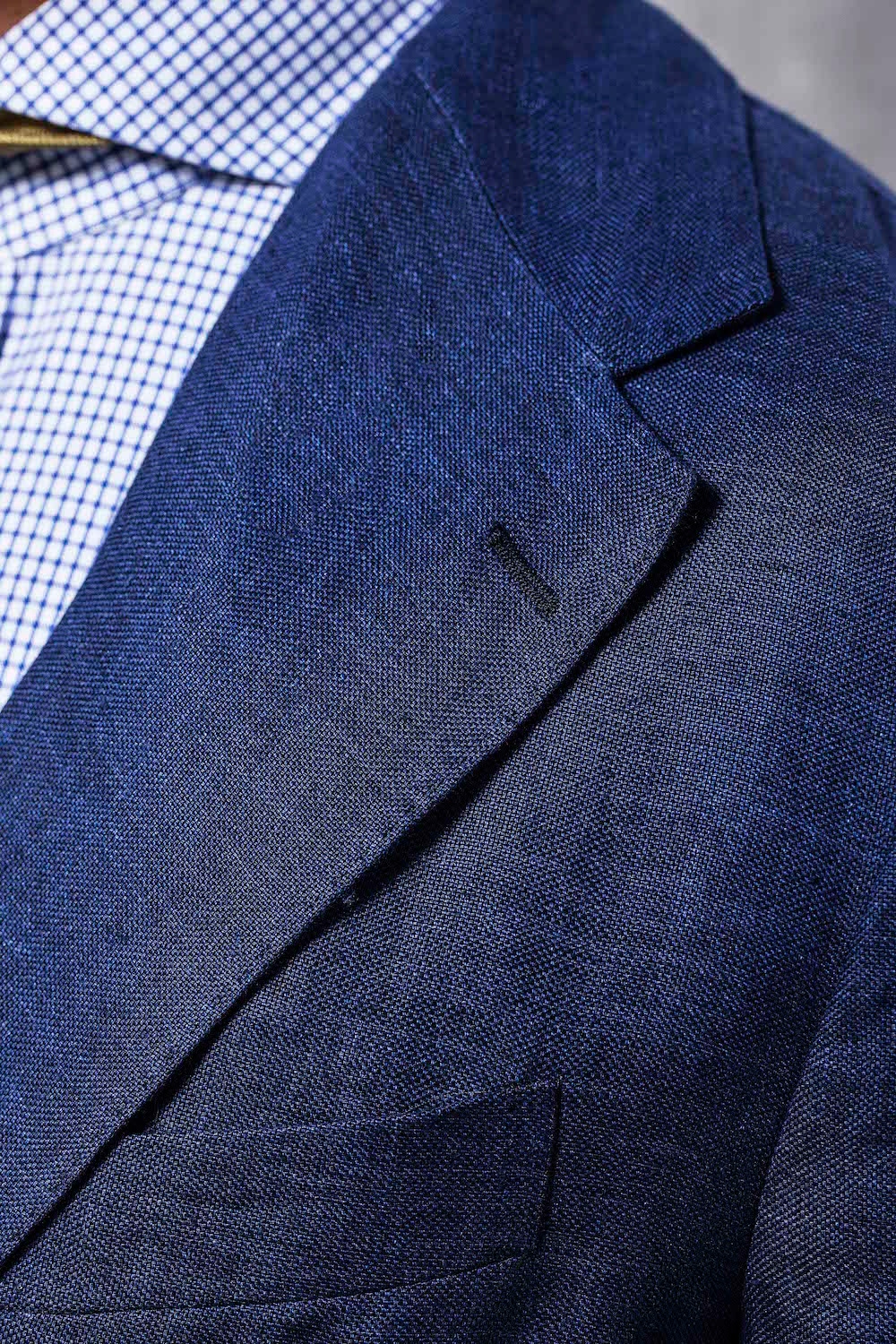 Note the typically Neapolitan dual line of topstitching along the blazer's lapels.