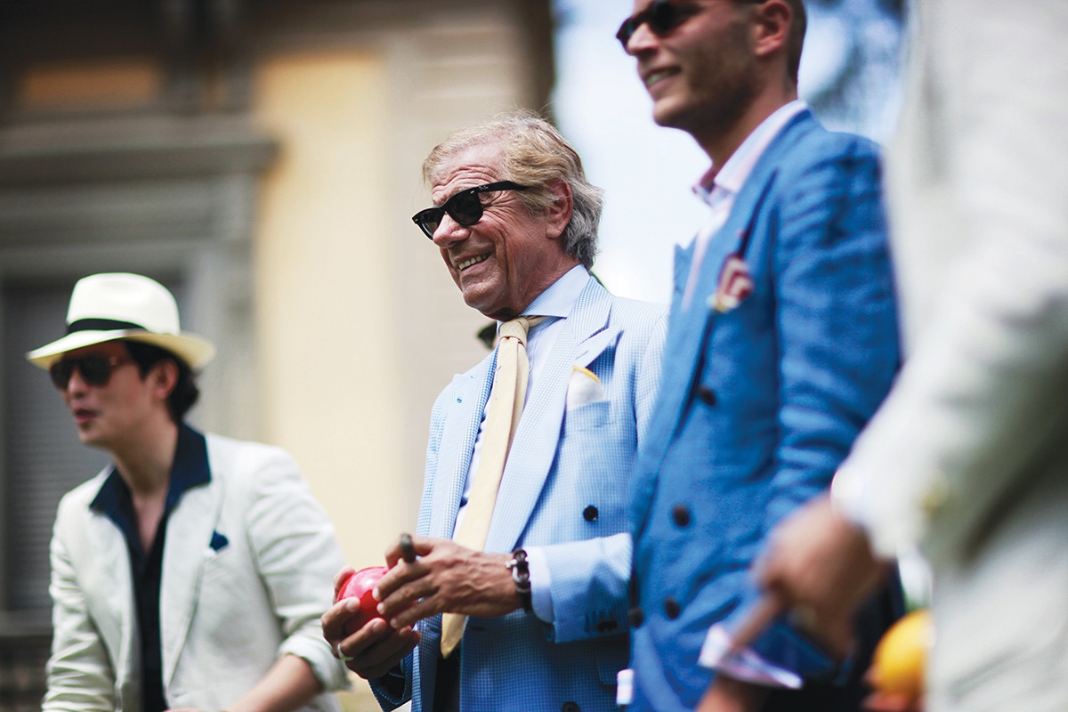 The Rake enjoys a game of bocce ball with a veritable pantheon of Italian style icons during Pitti Uomo, SS15.