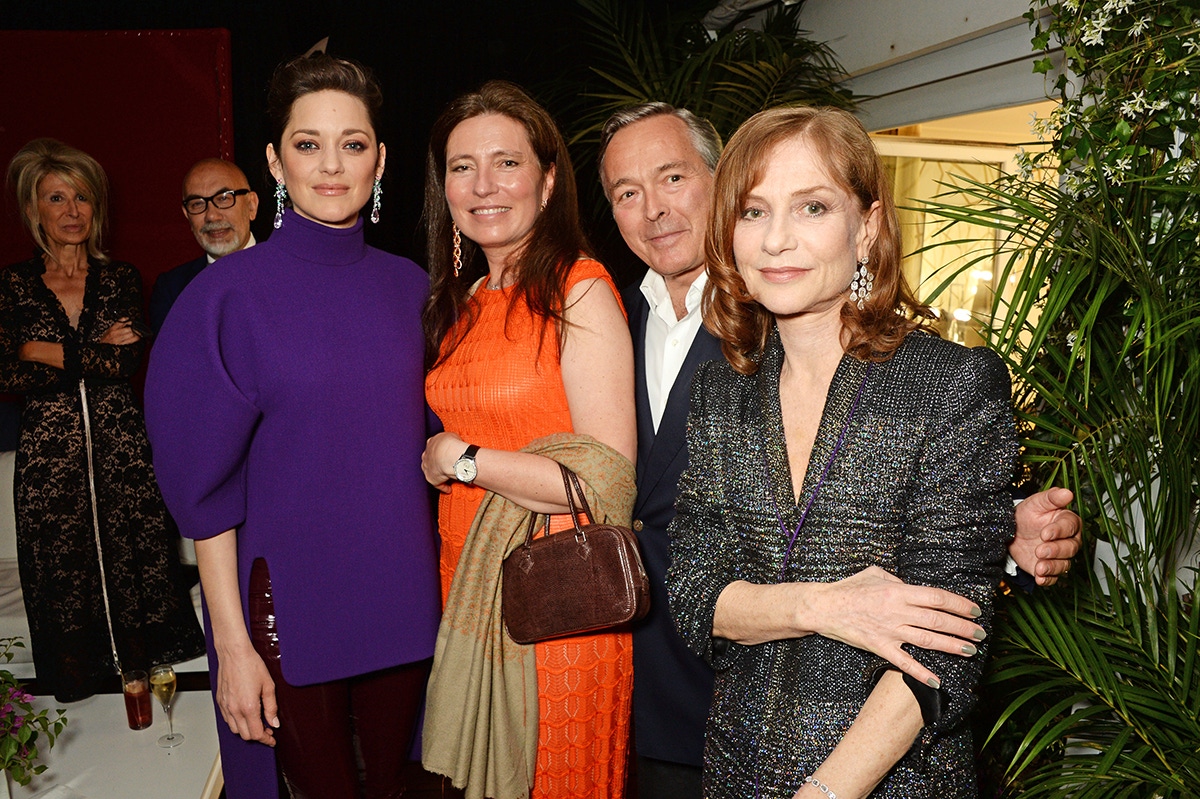 (L to R) Marion Cotillard, Christine Scheufele, Karl-Friedrich Scheufele, Co-President of Chopard, and Isabelle Huppert attend the Chopard x Annabel's Cannes party on May 14, 2016 in Cannes, France.