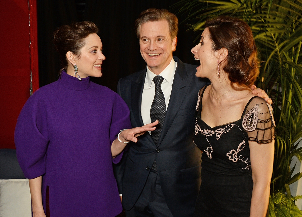 (L to R) Marion Cotillard, Colin Firth and Livia Firth attend the Chopard x Annabel's Cannes party on May 14, 2016 in Cannes, France.