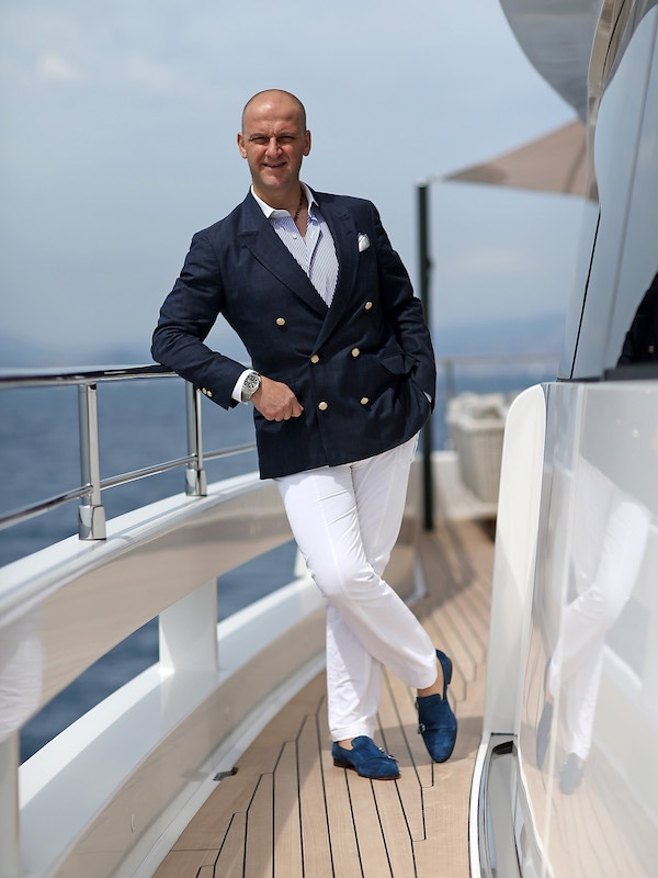 C.E.O of Santoni shoes company Giuseppe Santoni poses aboard 'Genesi' a Wider 150 yacht this May in Cannes. Photo by Pierre Suu