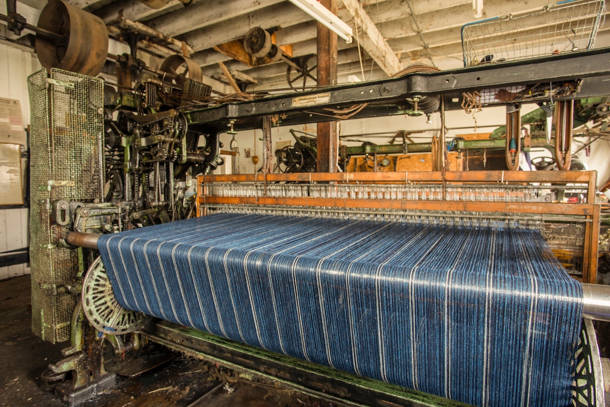 The warp running through the loom prior to weaving.