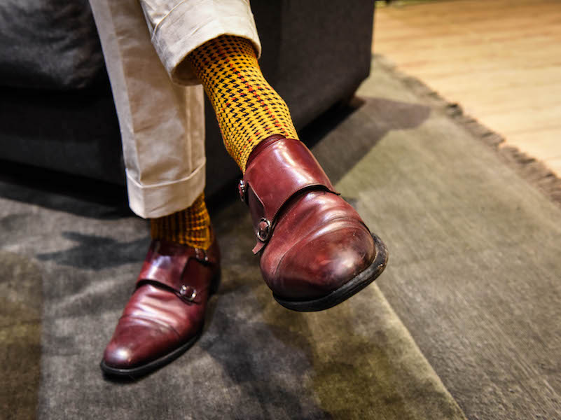 Joe’s socks are his own design – the result of a unique collaboration with the London Sock Co., a houndstooth pattern was chosen for its British quality, and the colours used for same reason: “they are inspired by the colours of British military dress” he explains, “the burnt orange comes from the gold of the epaulettes and the pillar-box red from the tunics of the Household Cavalry.”