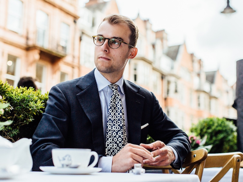 James's matt tortoise-shell round-framed spectacles are the de rigueur choice of the moment, from Oliver Peoples.