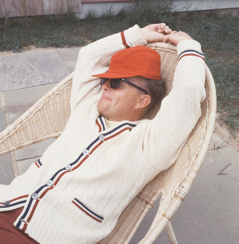 Author Truman Capote relaxes in wicker chair outside his Long Island home, 1965, New York. Image by © Condé Nast Archive/Corbis.