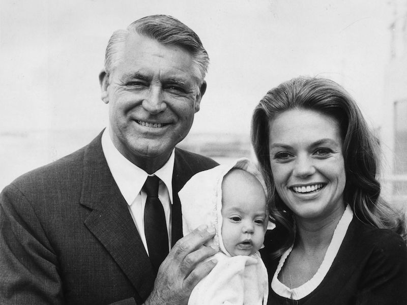 Grant with his fourth wife Dyan Cannon and their baby daughter Jennifer on a visit to England, 1966. Photo by Central Press/Getty Images.