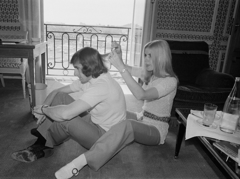 Sir  Jackie Stewart gets his hair cut by his wife Helen in Monte Carlo, Monaco, 8th May 1970. (Photo by Blackman/Daily Express/Getty Images)