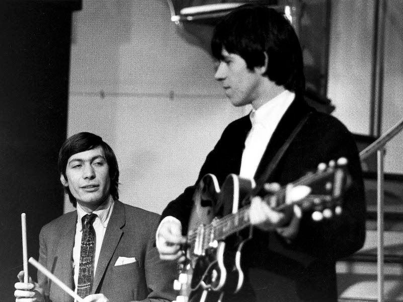 Charlie Watts with Keith Richards performing on Ready Steady Go! TV Show, at Television House studios. Photo by Val Wilmer/Redferns.