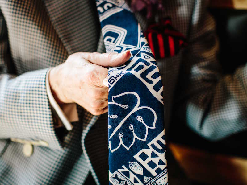 “This tie is nothing special – if a tie catches my eye, it can be from anywhere. This is from a charity shop and cost £2.50. It’s about you and your eye being able to pick it out.” It turns out the tie has come all the way from Hawaii, and his so-called handkerchief is equally curious. “It’s a scrap of fabric from Borovick on Berwick Street. It’s a great place to find different pieces that you can’t find anywhere else.”