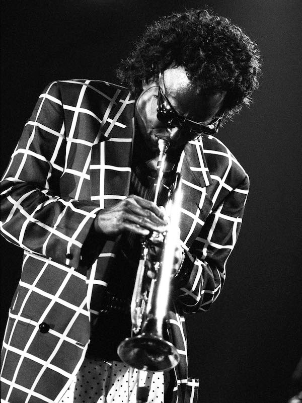 Miles Davis performs live on stage at the North Sea Jazz Festival in The Hague, Netherlands, 1991. Photo by Paul Bergen/Redferns.