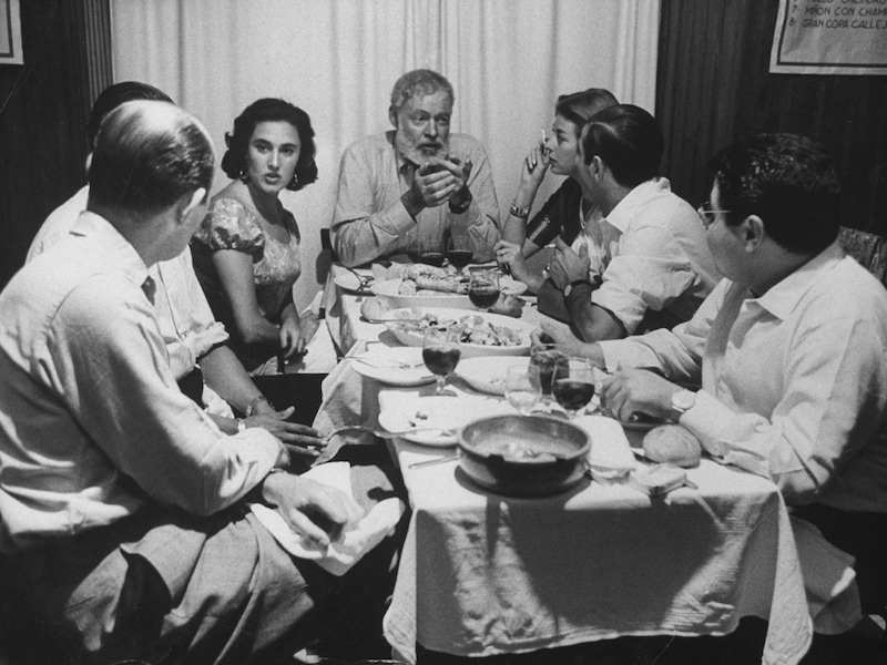 Author, Ernest Hemingway during visit with bullfighter Antonio Ordonez. Photo by Loomis Dean/The LIFE Picture Collection/Getty Images.