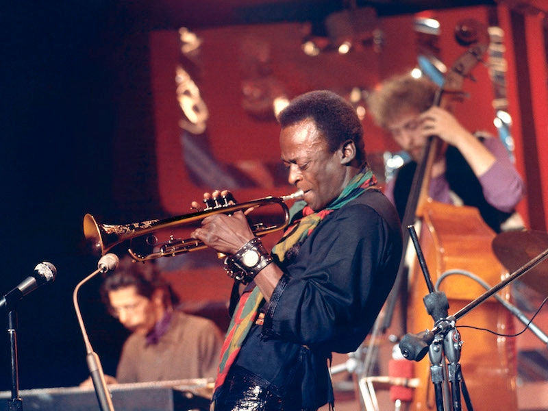 L-R: Chick Corea, Miles Davis, Dave Holland performing live onstage for BBC 'Jazz Scene' TV show David Redfern Premium Collection. Photo by David Redfern/Redferns.