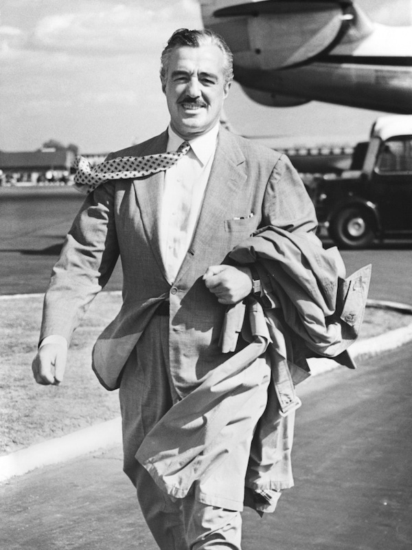 Italian actor and director Vittorio De Sica at London Airport, 1955. Image by © Hulton-Deutsch Collection/CORBIS.