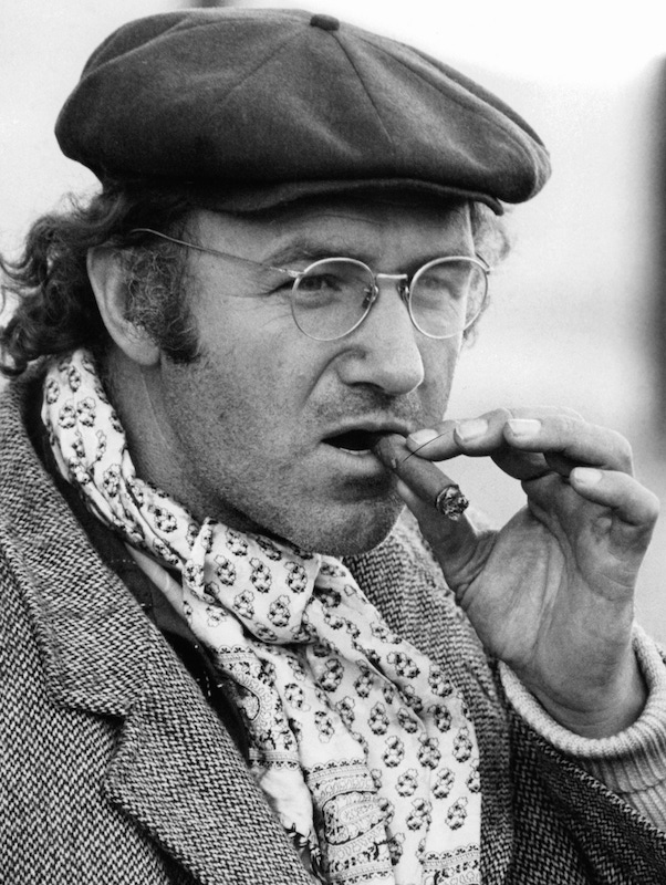 Gene Hackman smokes a cigar in a scene from the film 'Scarecrow', 1973. Photo by Warner Brothers/Getty Images.