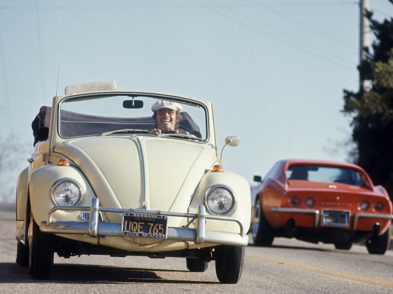 American actor Jack Nicholson laughs as he drives his white, convertible Volkswagon Beetle along an unidentified road, Los Angeles, California, September 4, 1969. Photo by Arthur Schatz/The LIFE Picture Collection/Getty Images.