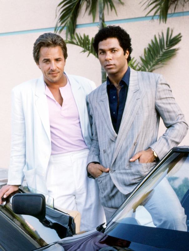 American actors Don Johnson and Philip Michael Thomas, as detectives James 'Sonny' Crockett and Ricardo Tubbs, in a promotional portrait for the TV series 'Miami Vice', circa 1985. Photo by Silver Screen Collection/Getty Images.