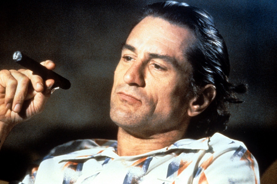 Robert De Niro smokes a cigar in a scene from the film  'Cape Fear', 1991. Photo by Universal/Getty Images.