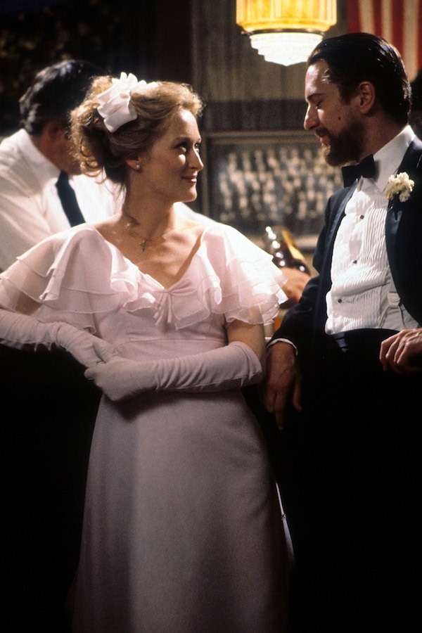 Meryl Streep smiling at Robert De Niro in a scene from the film 'The Deer Hunter', 1978. Photo by Universal/Getty Images.