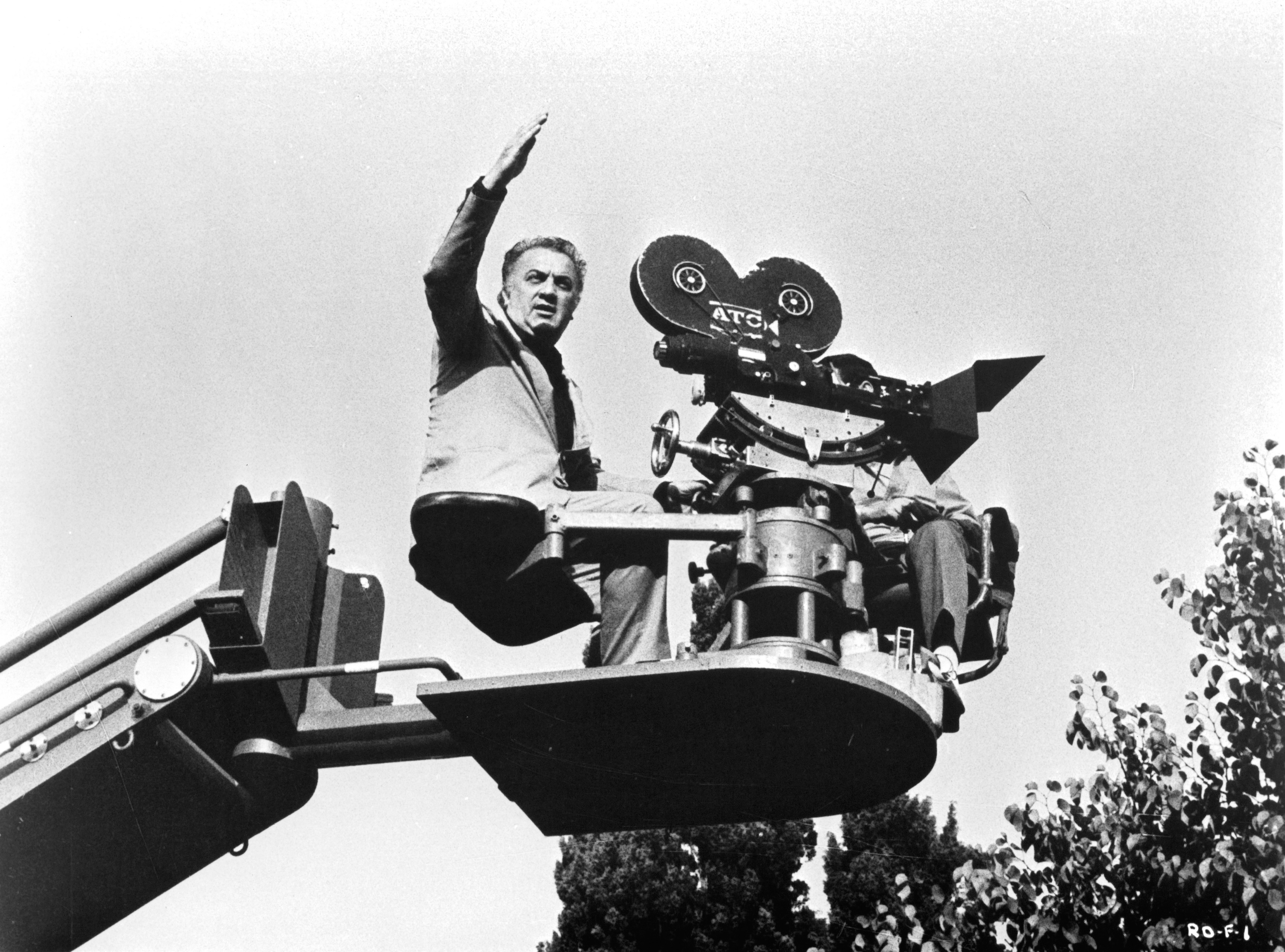 Director Federico Fellini behind the scenes of the United Artist movie 