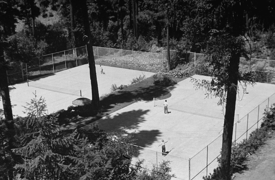 An aerial view showing the tennis courts on publisher William Randolph Hearst's estate. Photo by Peter Stackpole/The LIFE Picture Collection/Getty Images.