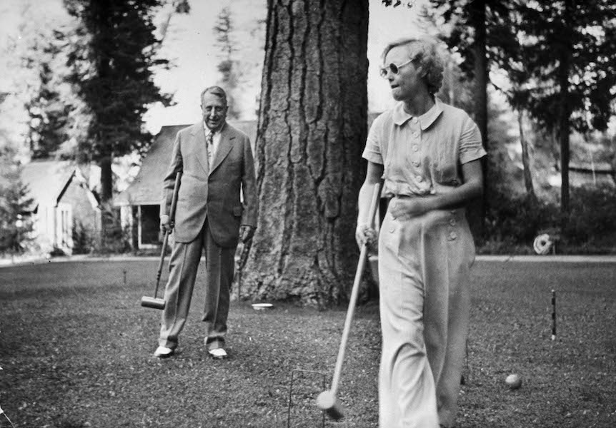 William Randolph Hearst Sr., and actress Marion Davies playing croquet on the grounds of his 50,000-acre estate, Wyntoon, 1935. Photo by Peter Stackpole/Life Magazine/The LIFE Picture Collection/Getty Images.