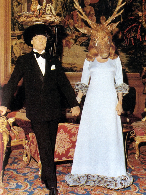 The baron and baroness holding court at their famous soirée, the 'Diner de Têtes Surrealistes', in 1972.