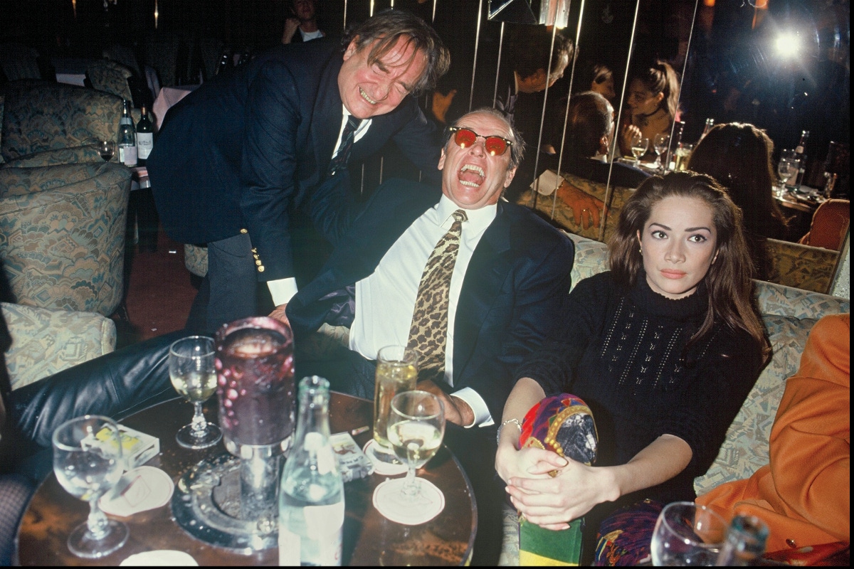 Photographer Willie Rizzo with a howling Jack Nicholson at Régine's in 1993.