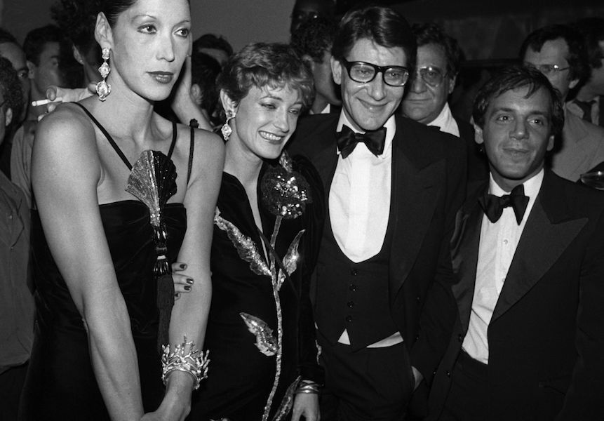 Marina Schiano, Loulou Klossowski, Yves Saint Laurent and Steve Rubell attend Laurent's launch party for his Opium fragrance which took place aboard The Peking, a tall ship docked at The South Street Seaport.  Photo by John Bright/Penske Media/REX/Shutterstock.