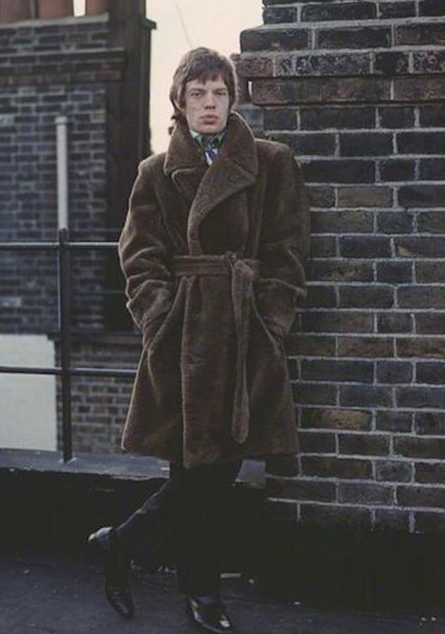 Mick Jagger wears a chocolate brown teddy bear coat.