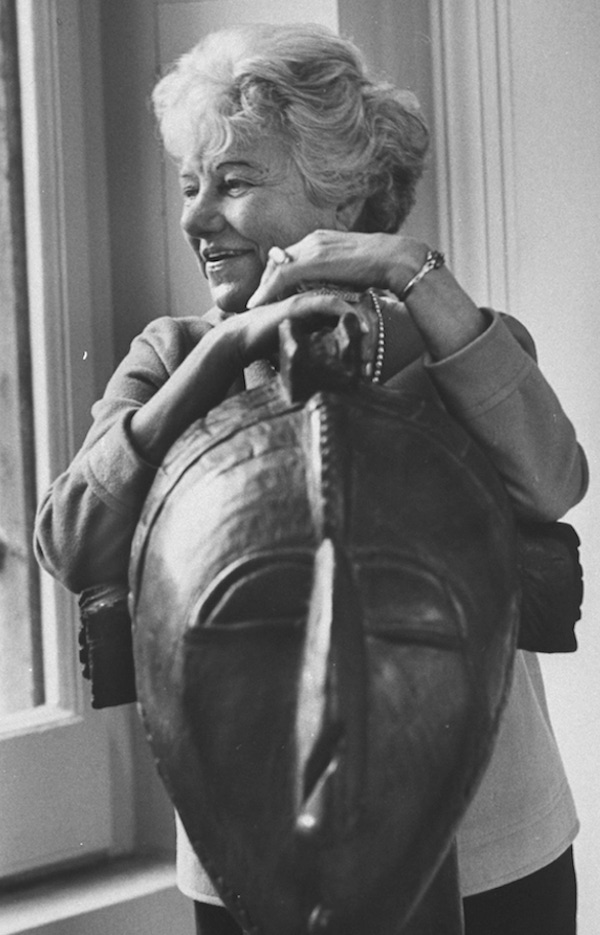 Peggy Guggenheim with Guinean native mask at her palazzo-gallery. Photo by Carlo Bavagnoli/The LIFE Picture Collection/Getty Images.