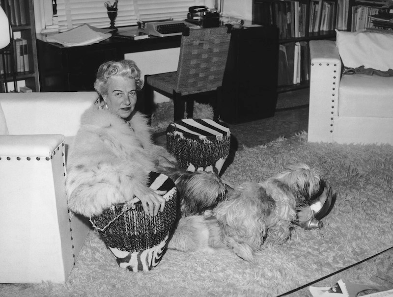Peggy Guggenheim at her home in Venice with her dogs , December 1961. Photo by Keystone Features/Hulton Archive/Getty Images.