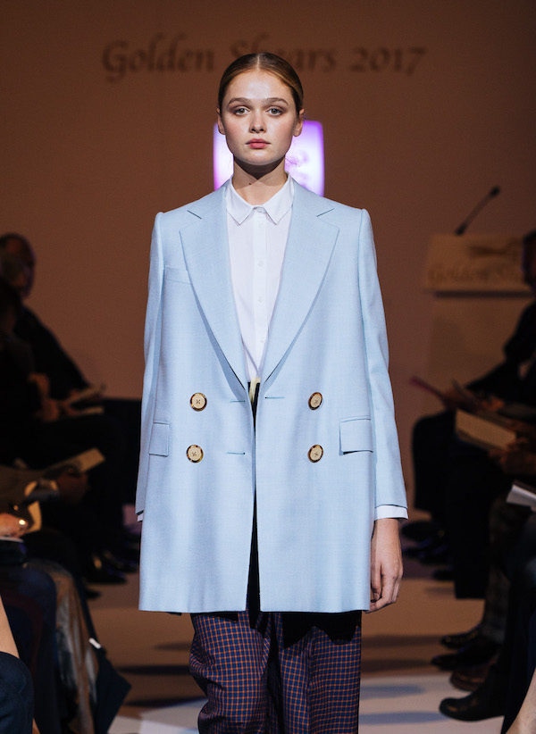 Double breasted baby blue coat by Rachel Singer, student at Savile Row Academy.