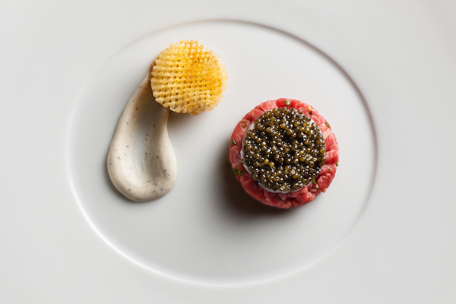 Raw Wagyu Beef, Langoustines and Osetra Caviar with Black Pepper-Vodka Crème Fraîche and Pomme Gaufretteprepared by Eric Ripert, Chef of Le Bernardin in NYC.