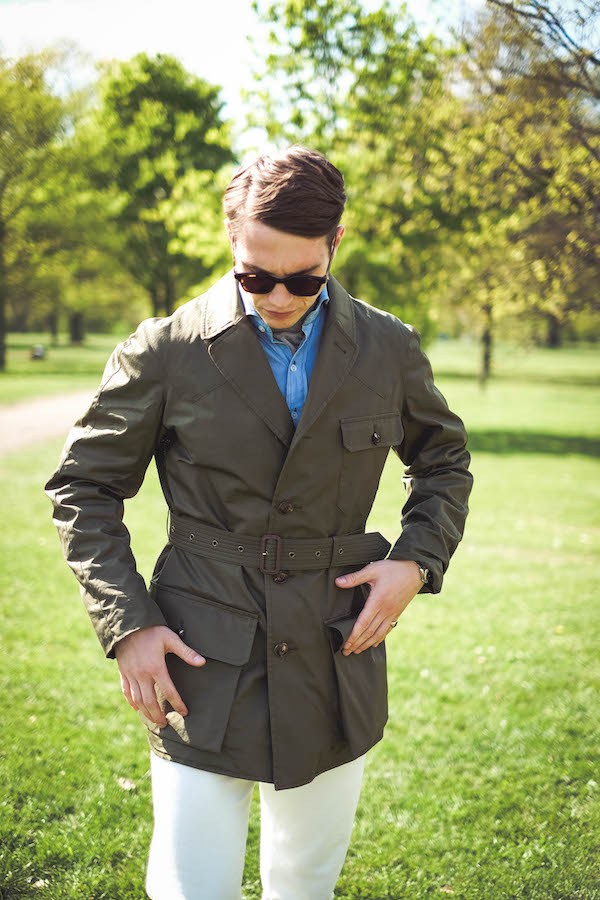 Shooter Jacket by Grenfell x The Rake; powder blue denim shirt, Drake’s for The Rake; grey roll neck, Sunspel; white jeans, Dunhill; Chelsea boots, Crockett & Jones; bag, Troubabdour; sunglasses, watch and ring property of the stylist.