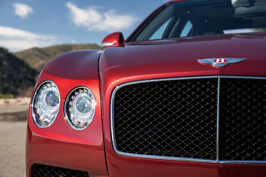 The rounded headlights, 'B' Bentley badge and aggressively wide grill are all synonymous with Bentley.