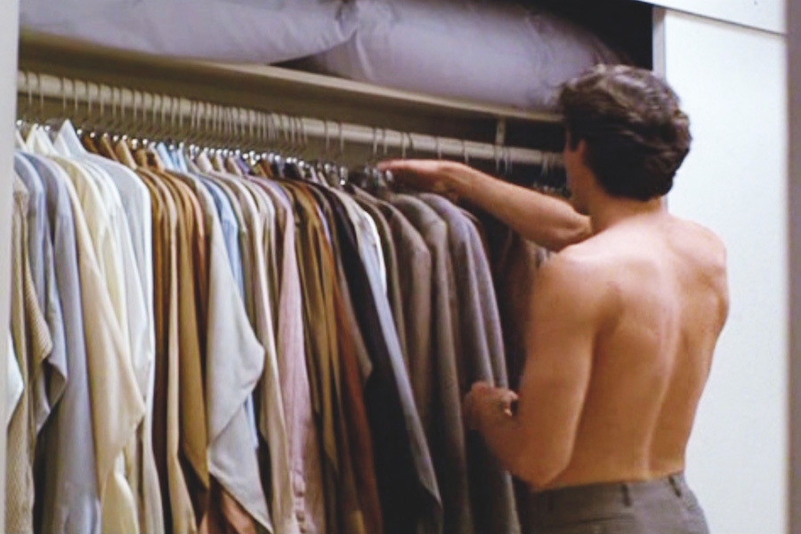 Julian played by Richard Gere, chooses a shirt from his wardrobe in American Gigolo, 1980.