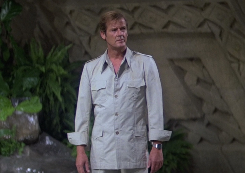 Roger Moore displaying his next-level safari game, deploying the louche turn-back cuff technique in Moonraker, 1979.